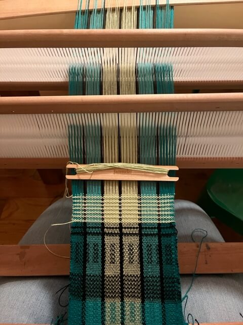 rigid heddle loom in use