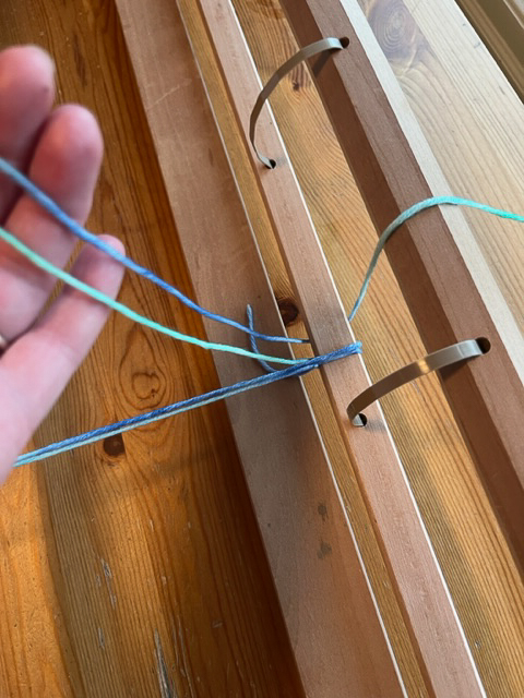 Wrapping around rigid heddle back beam